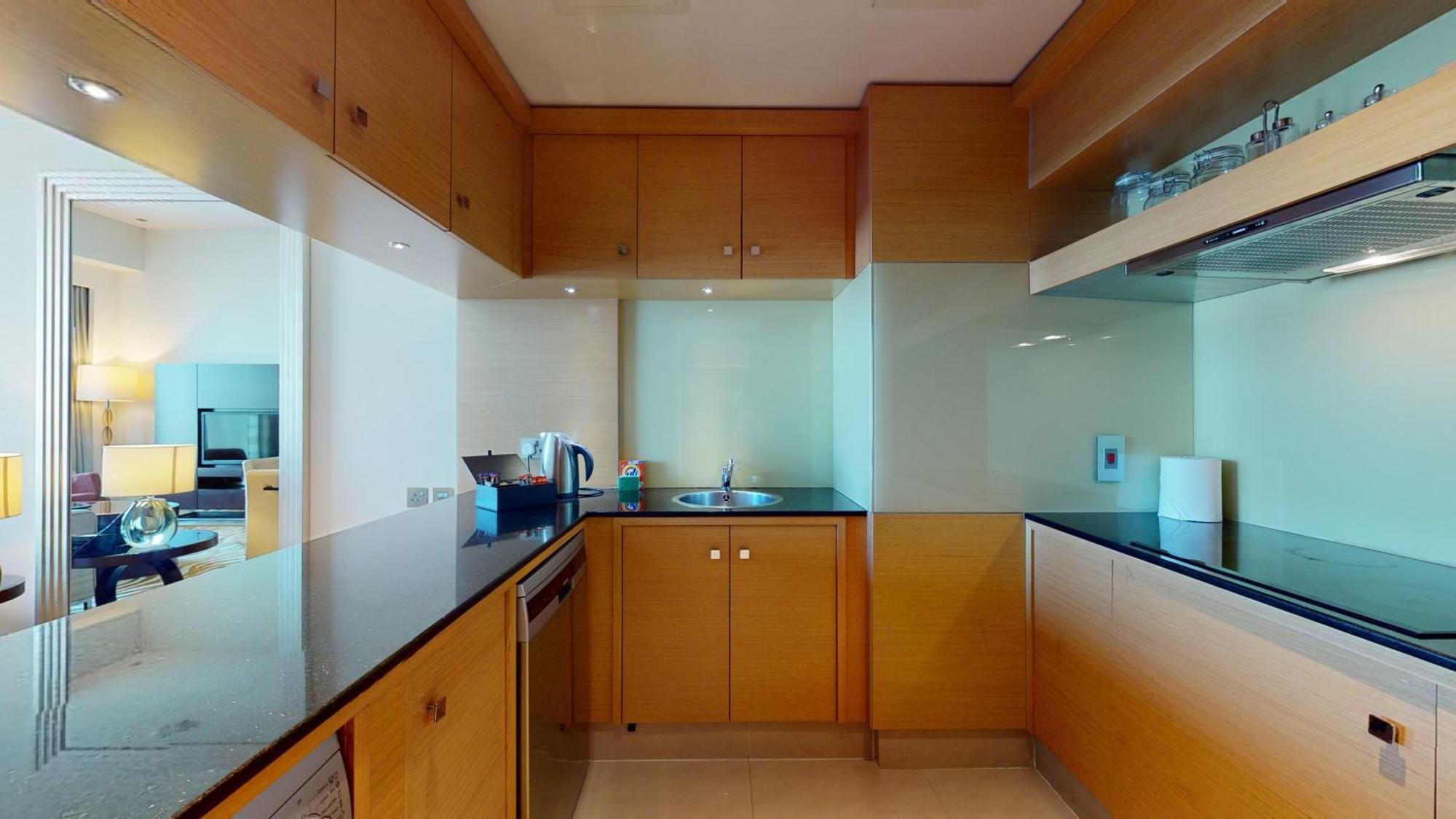 Marriott Executive Apartments Al Jaddaf, Dubai Zimmer foto A kitchen in a hotel suite